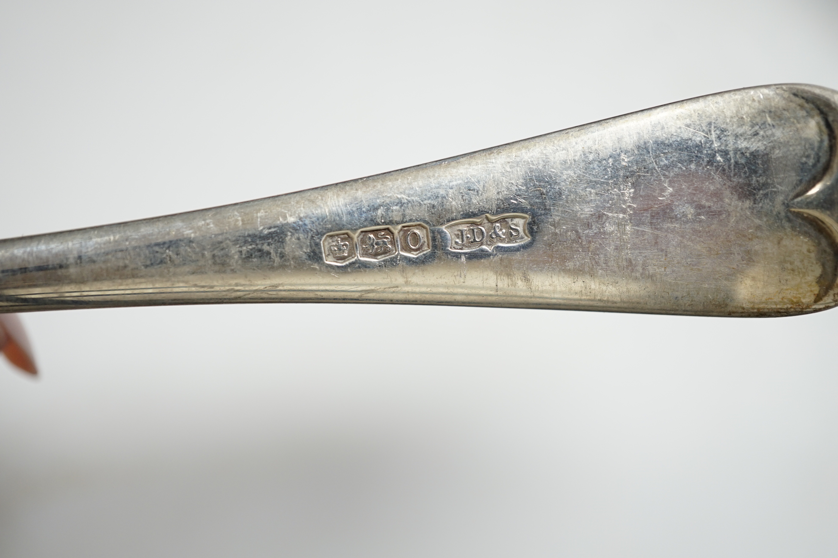 A set of six George V silver Old English pattern soup spoons, by James Dixon & Sons, a set of six silver handled tea knives and a pair of silver sugar tongs.